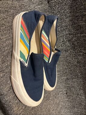 Vans Navy Slip-On Sneakers with Multicolor Stripe Lining